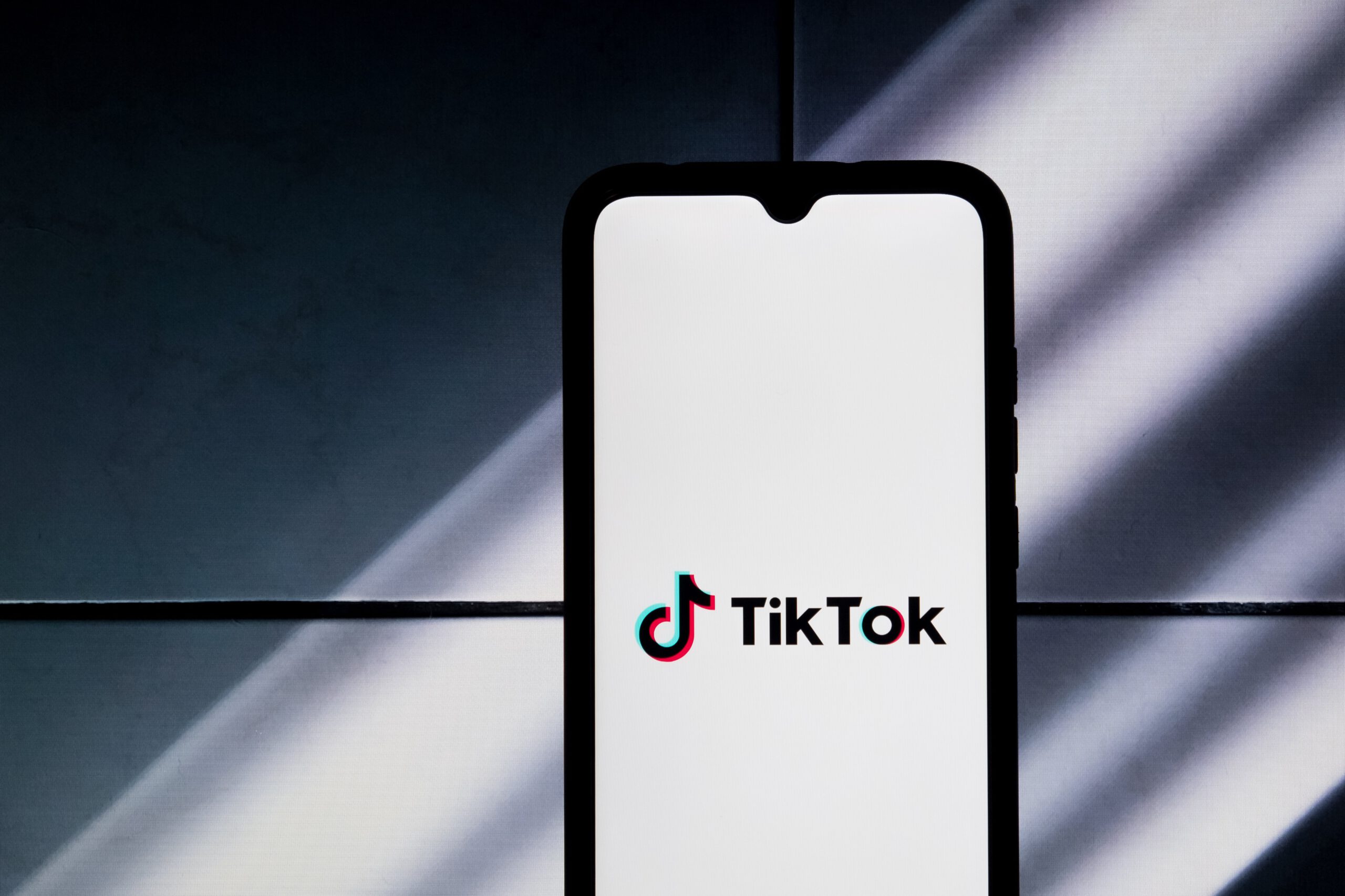 Phone displaying the TikTok logo.