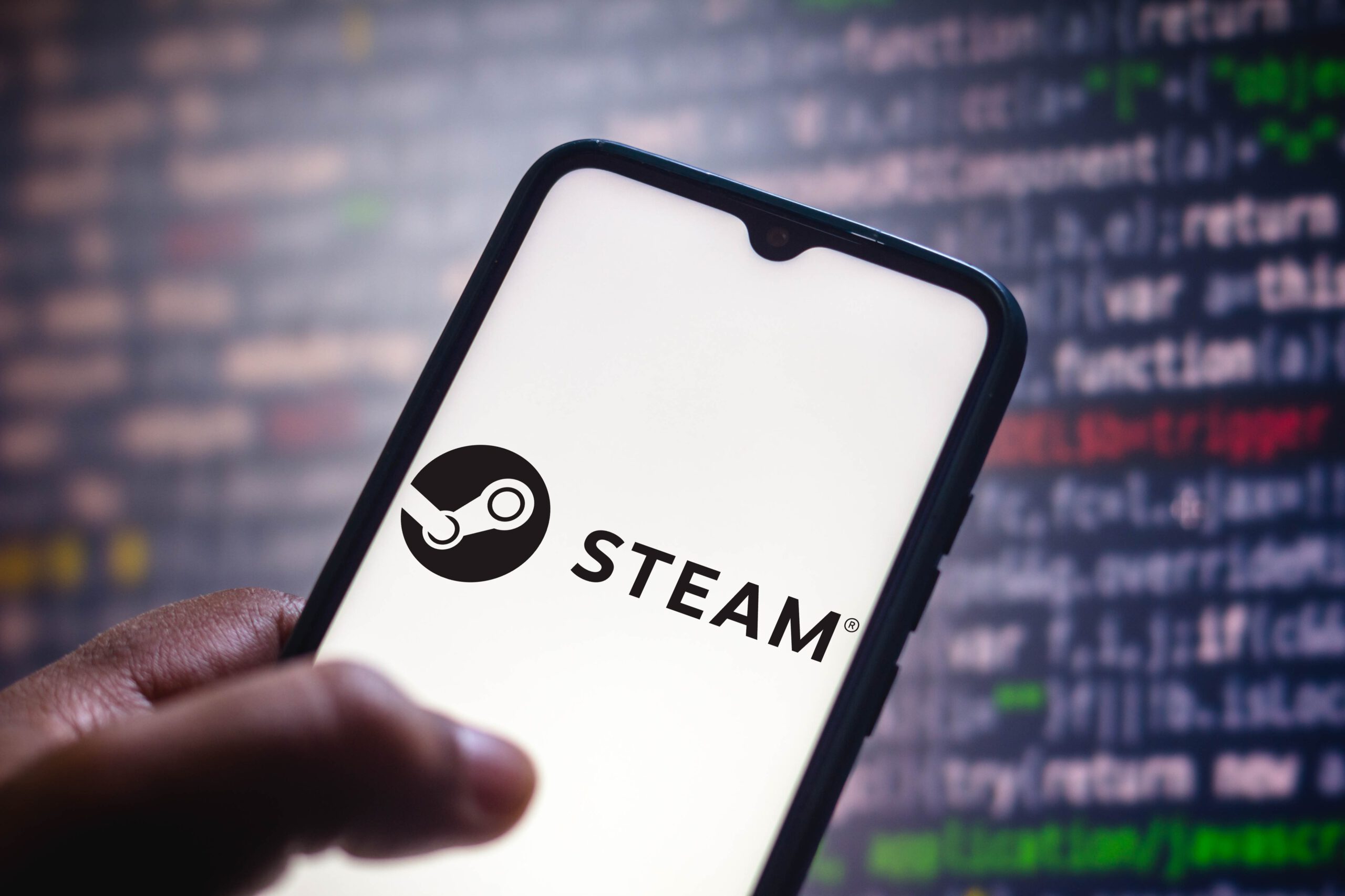In this photo illustration the Steam logo seen displayed on a smartphone screen