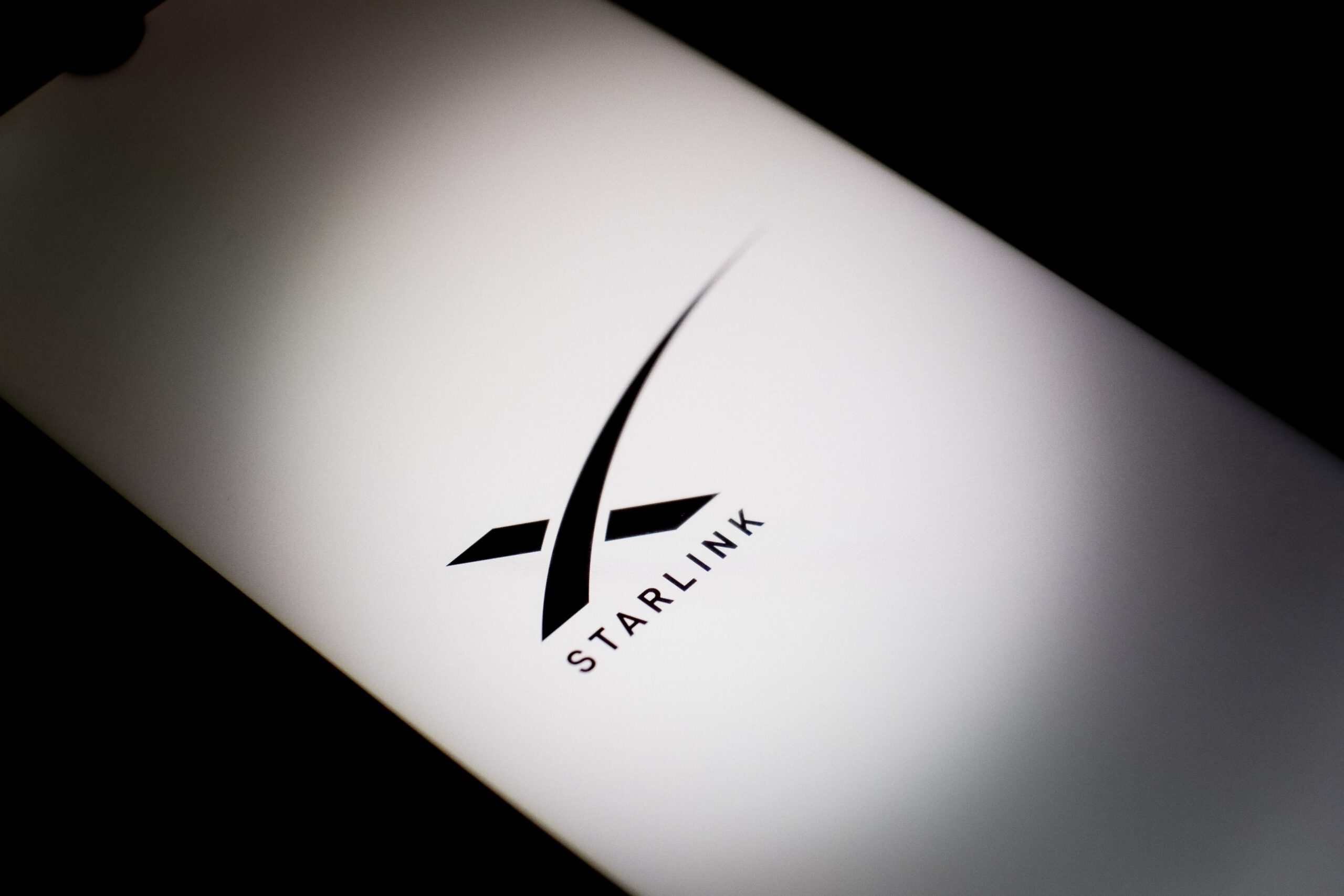 Starlink logo on smartphone