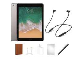 iPad with Beats Flex headphones and other accessories