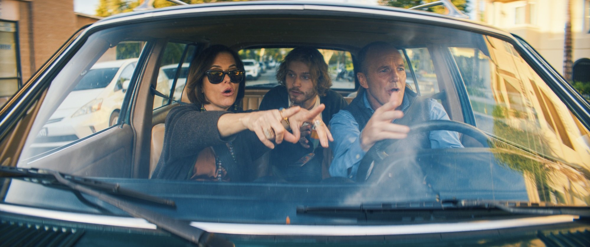 Parker Posey, Fred Hechinger, and Clark Gregg in "Thelma."