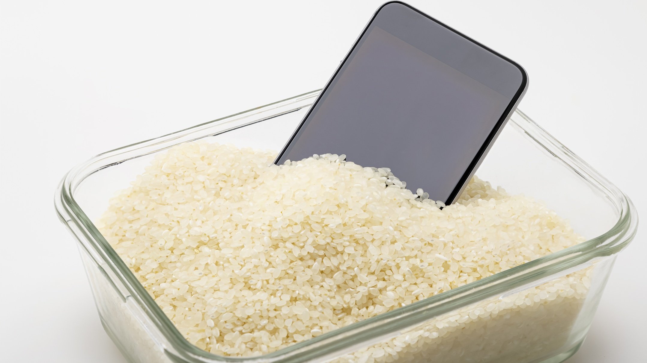 Dead phone inside a bowl of rice