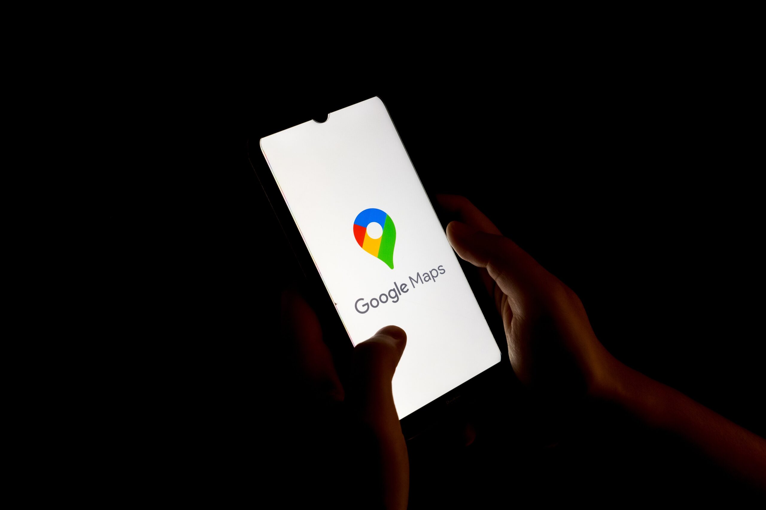 a Google Maps logo seen displayed on a smartphone screen