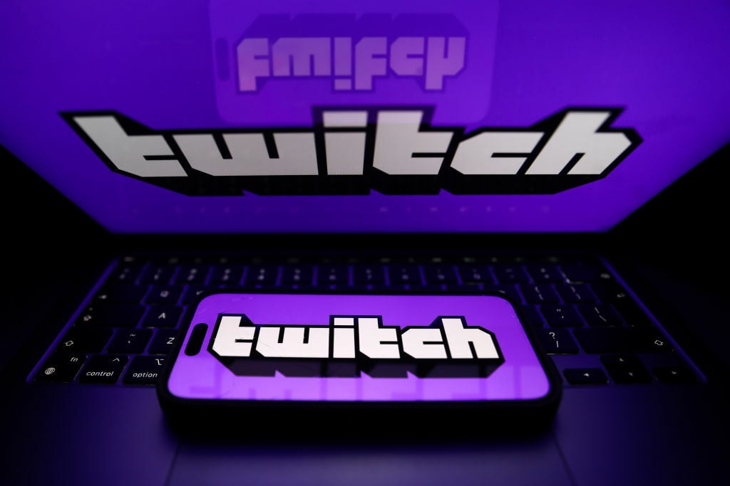 Twitch logo on phone and laptop screens