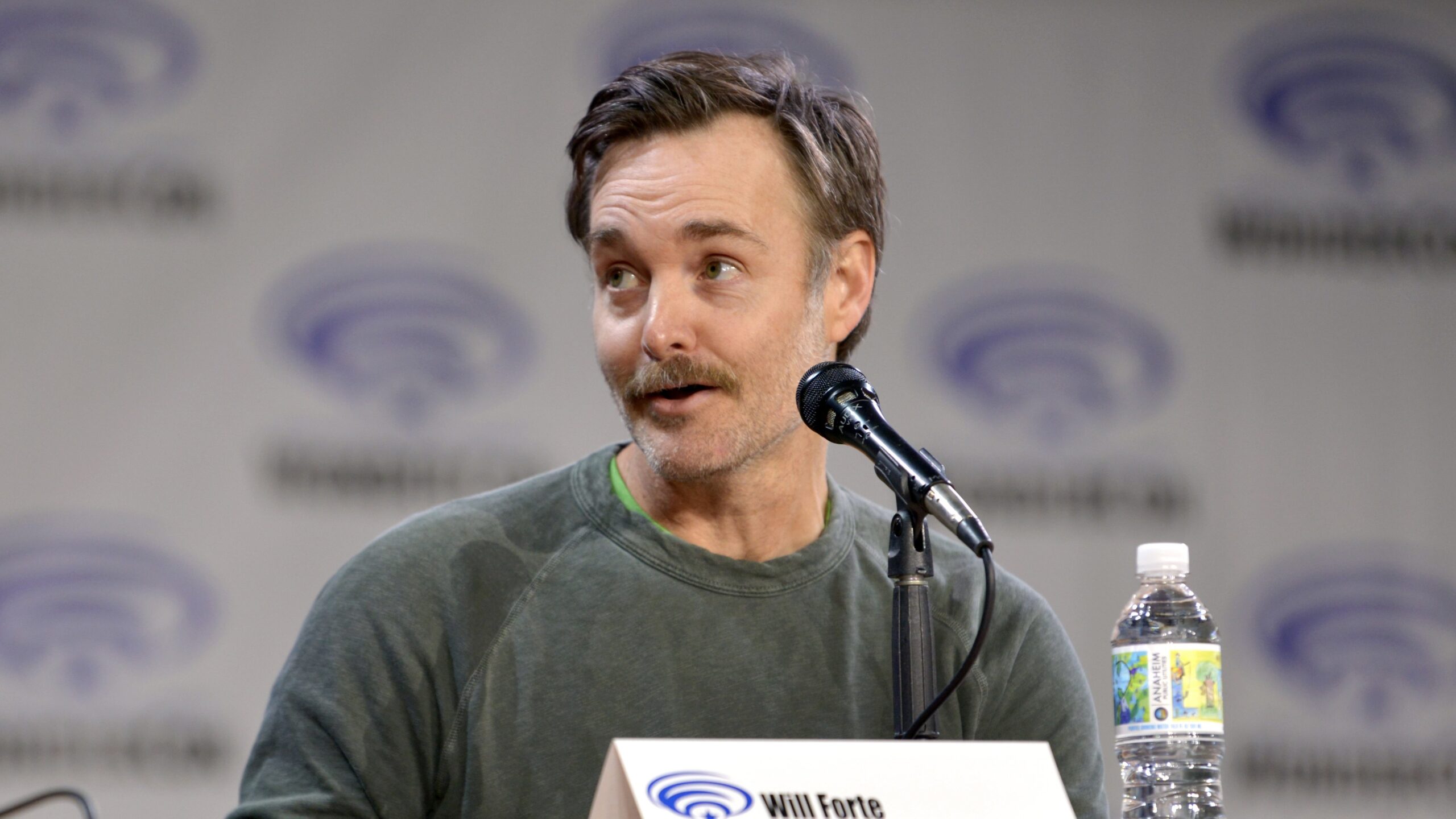 Will Forte speaking at a panel.