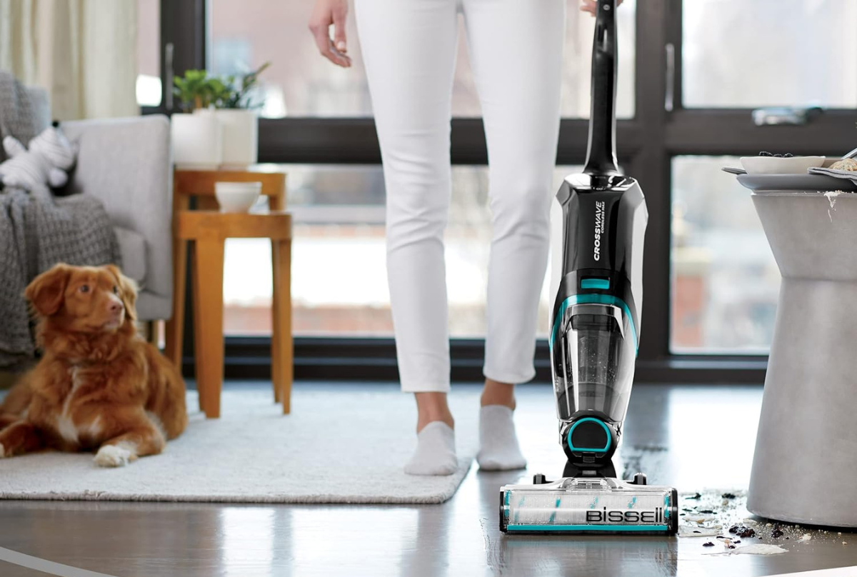 woman vacuuming floor 
