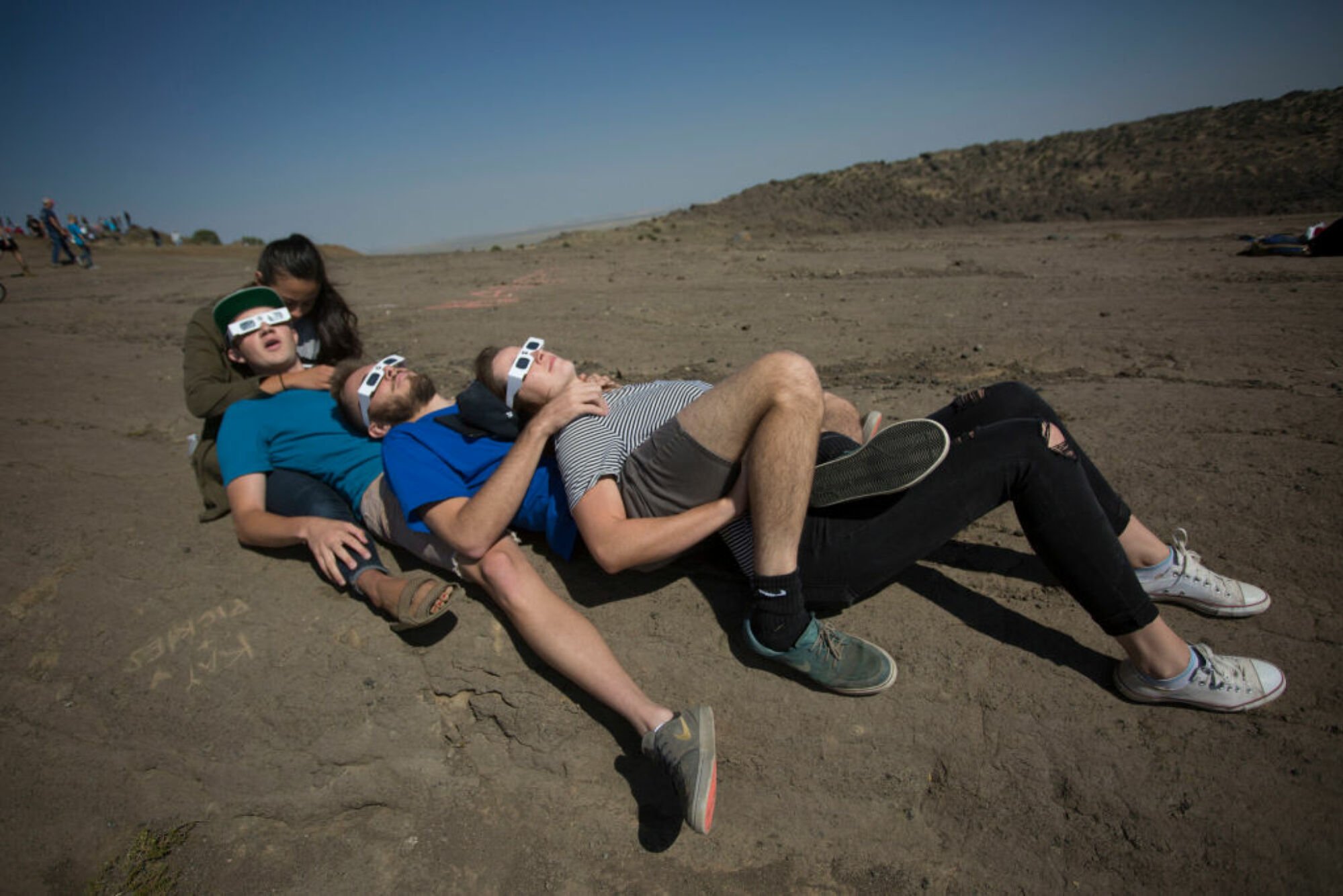 College students watching a total solar eclipse together