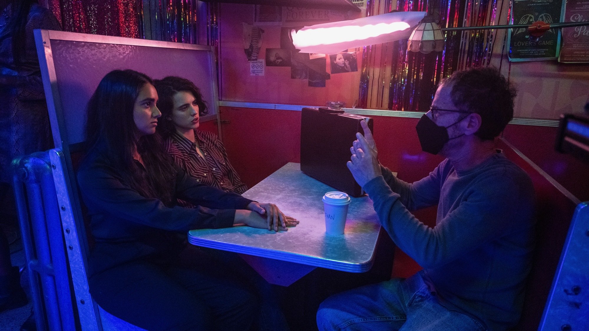 Geraldine Viswanathan, Margaret Qualley, and Ethan Coen on the set of "Drive-Away Dolls."