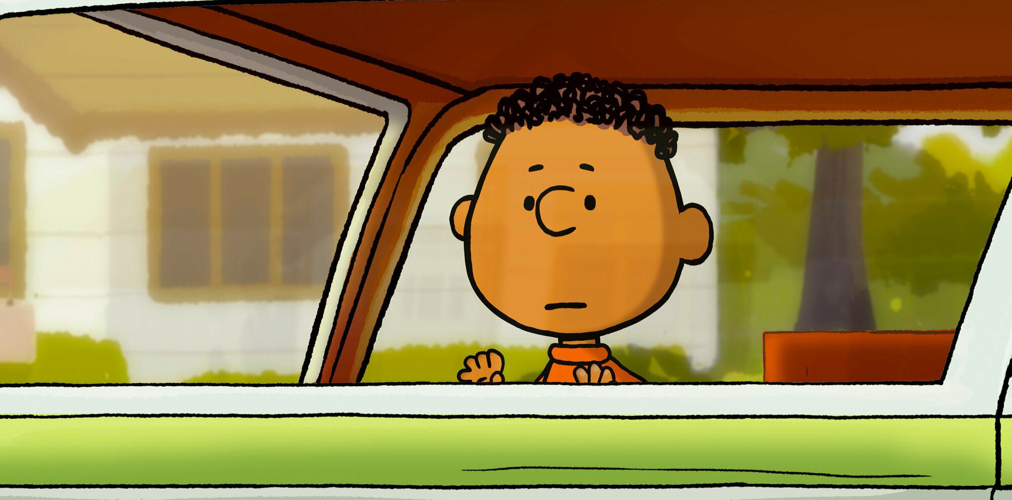 Franklin stares out the window of a green car.