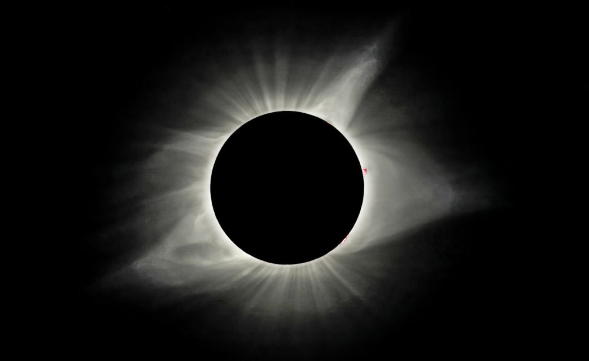The sun's corona glowing during a total solar eclipse