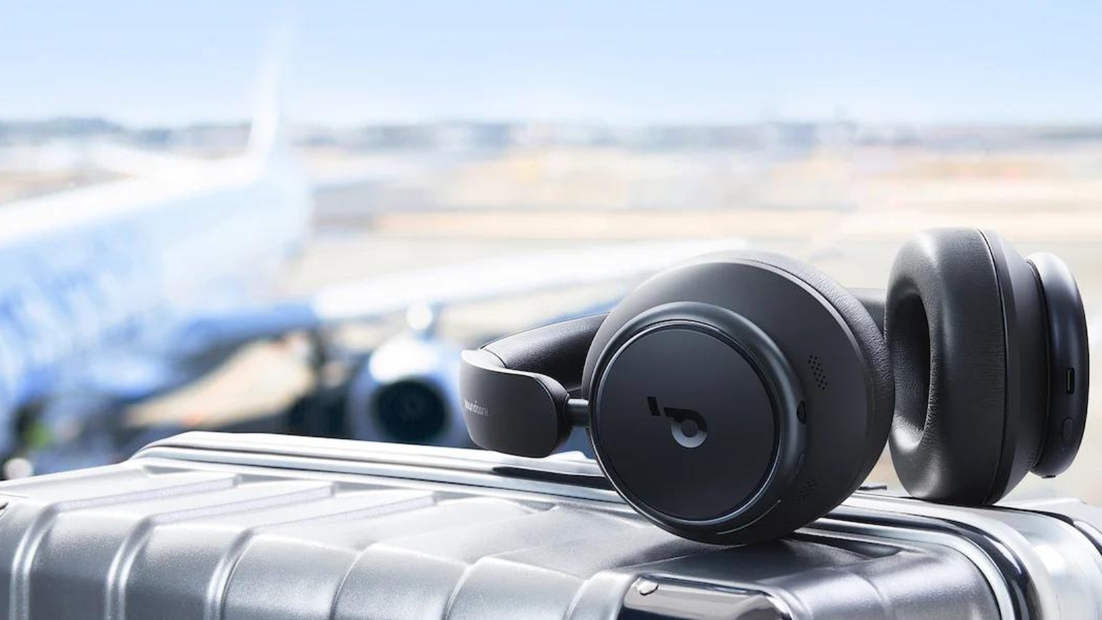 Anker Soundcore Space Q45 headphones on top of suitcase at airport