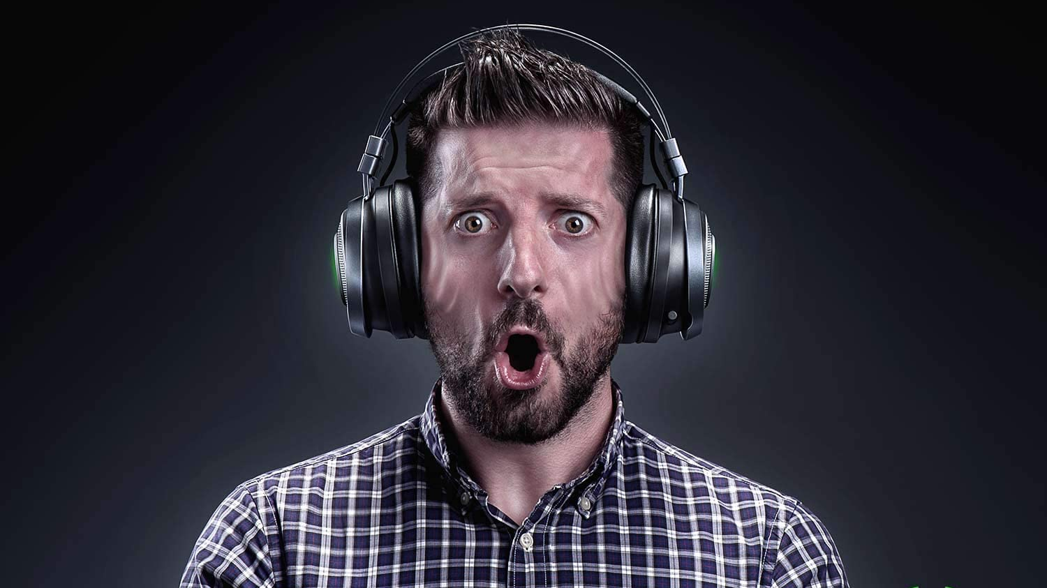 Gamer's face while wearing headphones