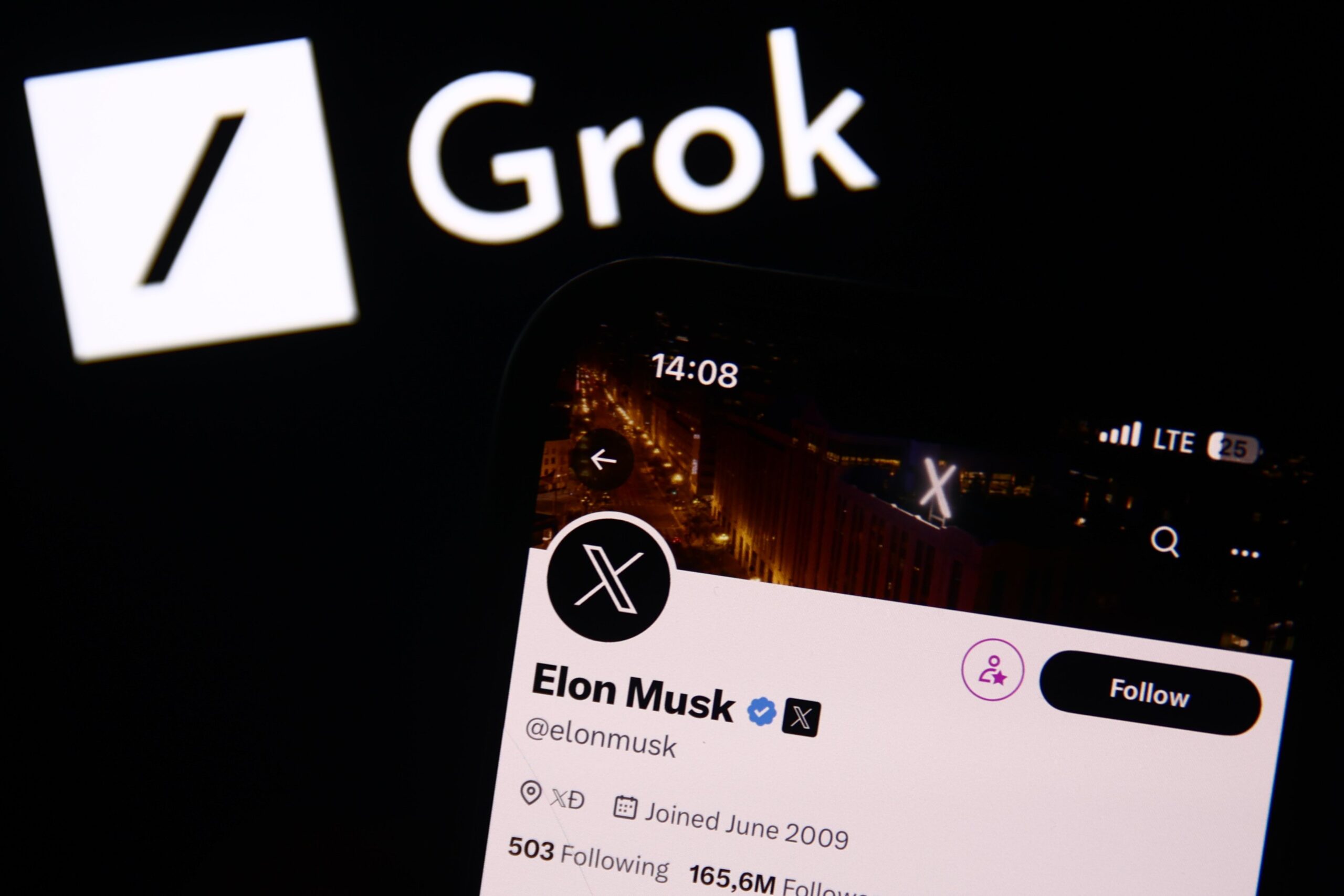 Grok logo displayed on a laptop screen and Elon Musk account on X displayed on a phone screen are seen in this illustration photo taken in Krakow, Poland on December 8, 2023.