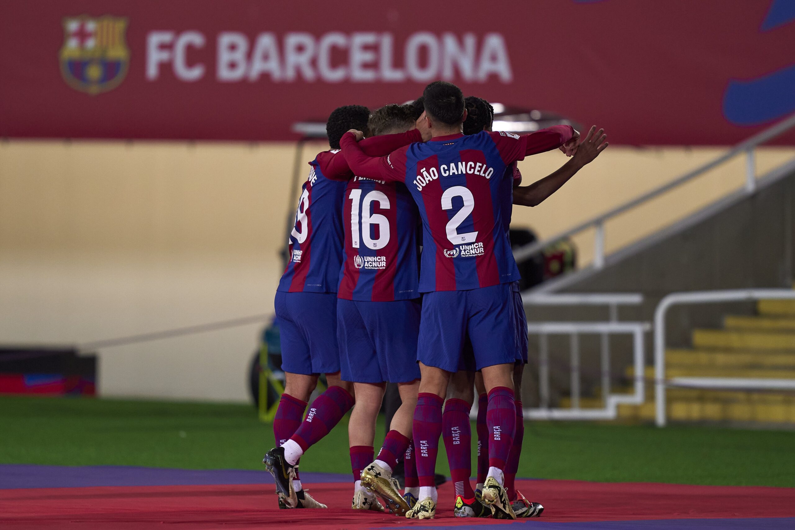 Players of FC Barcelona celebrating their team's first goal
