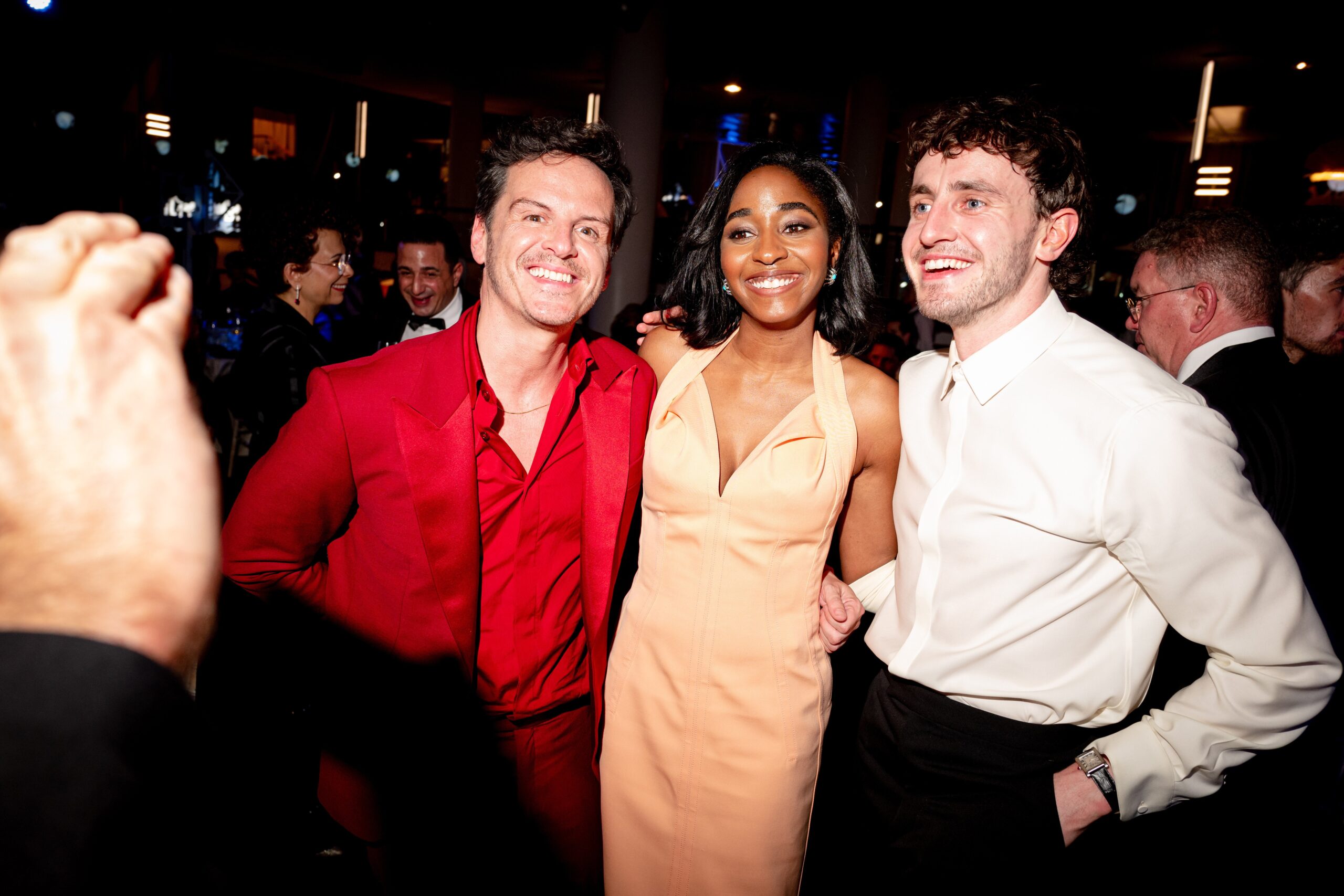 Andrew Scott, Ayo Edebiri, and Paul Mescal posing for a photo at the BAFTAs.