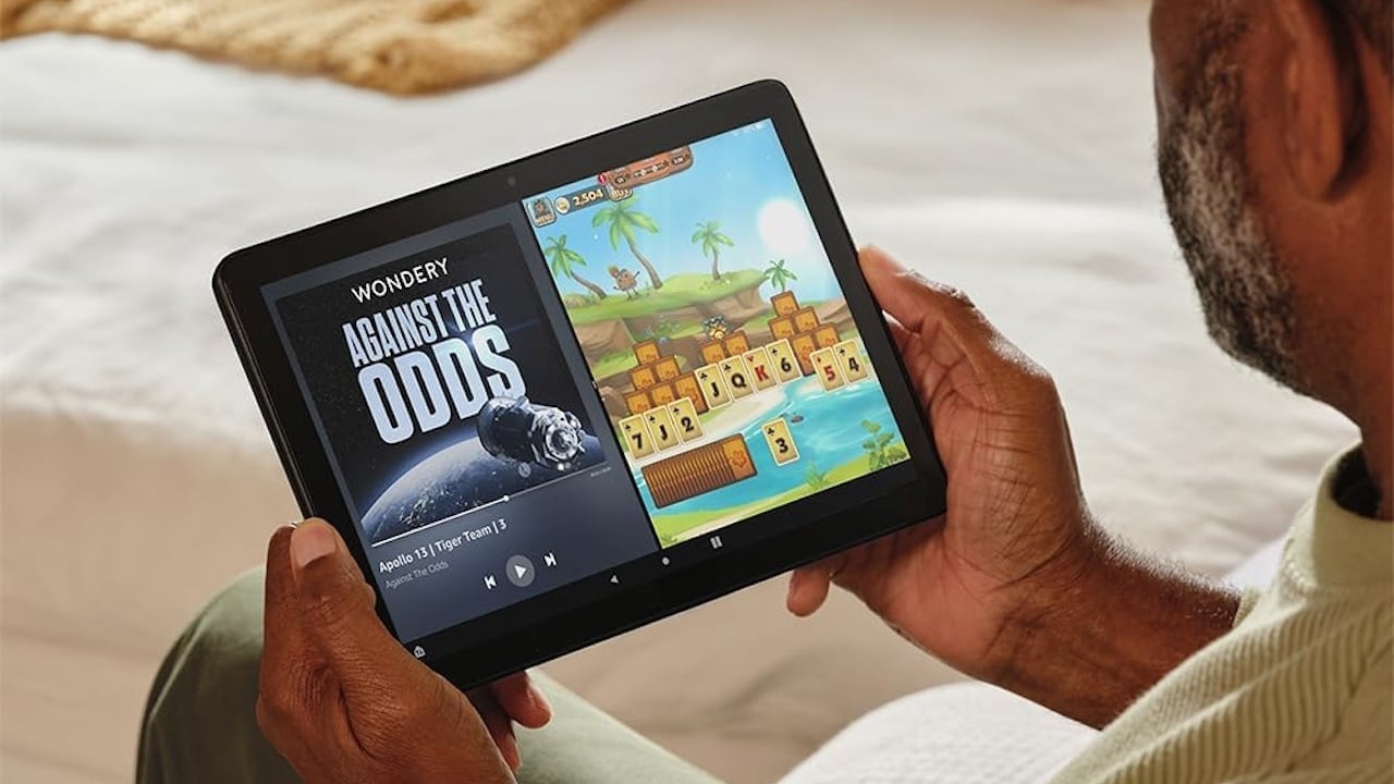 Person using an Amazon Fire HD 10 tablet