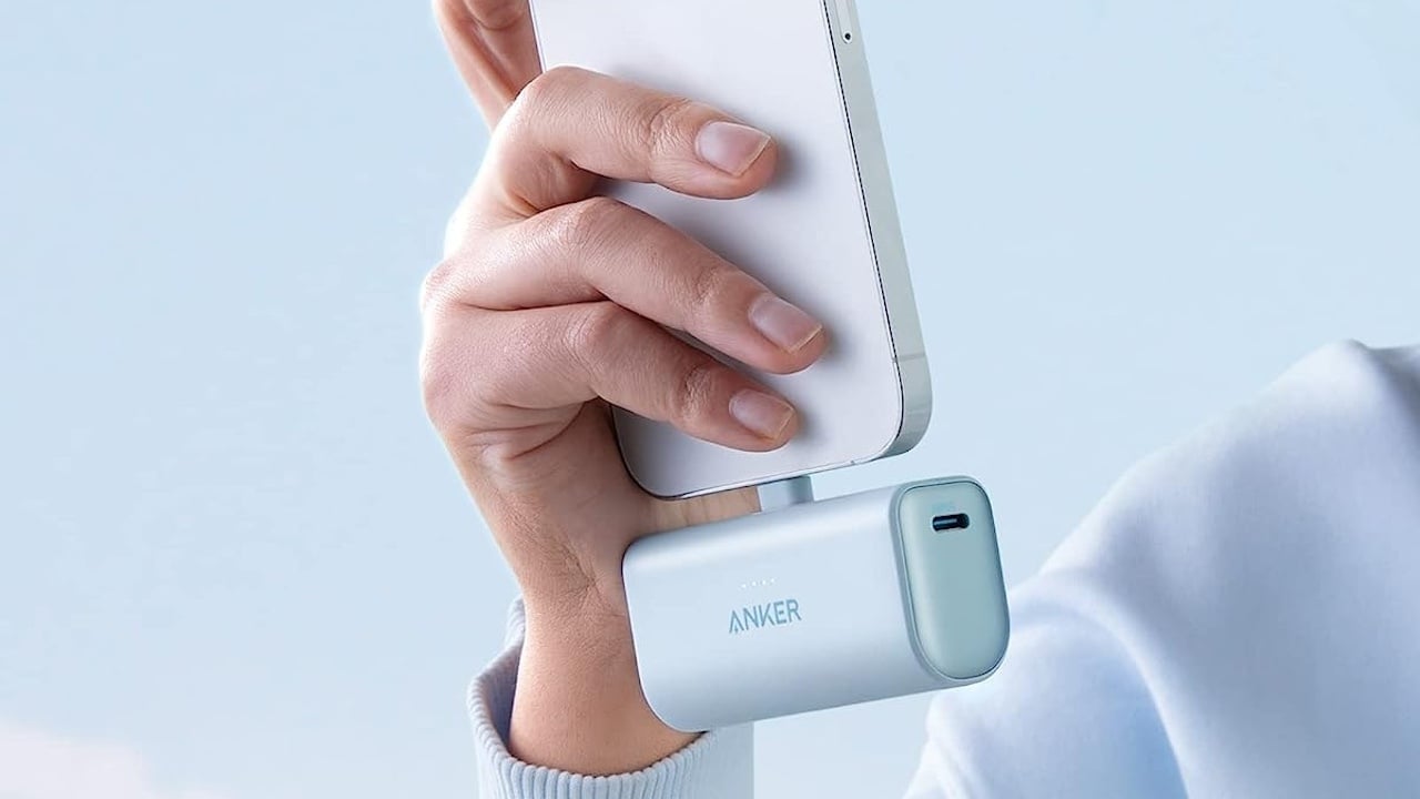 Person using Anker Nano portable charger