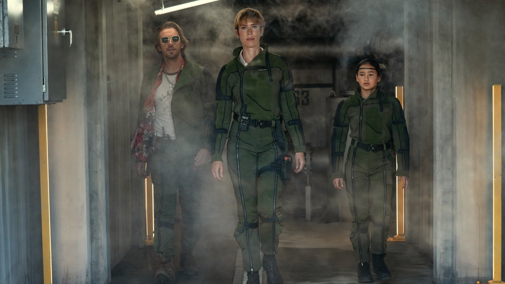 Dan Stevens as Trapper, Rebecca Hall as Dr. Ilene Andrews, and Kaylee Hottle as Jia in Warner Bros. Pictures and Legendary Pictures’ action adventure "Godzilla x Kong: The New Empire," a Warner Bros. Pictures release.