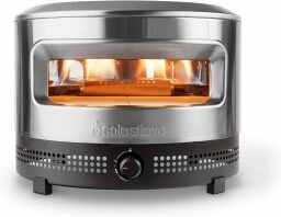 Solo Stove pizza oven with flames inside