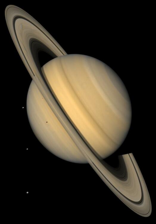 Saturn and four of its moons, captured by Voyager 2 in 1981.