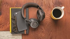 Plantronics BackBeat Pro 2 headphones on desk with coffee mug 