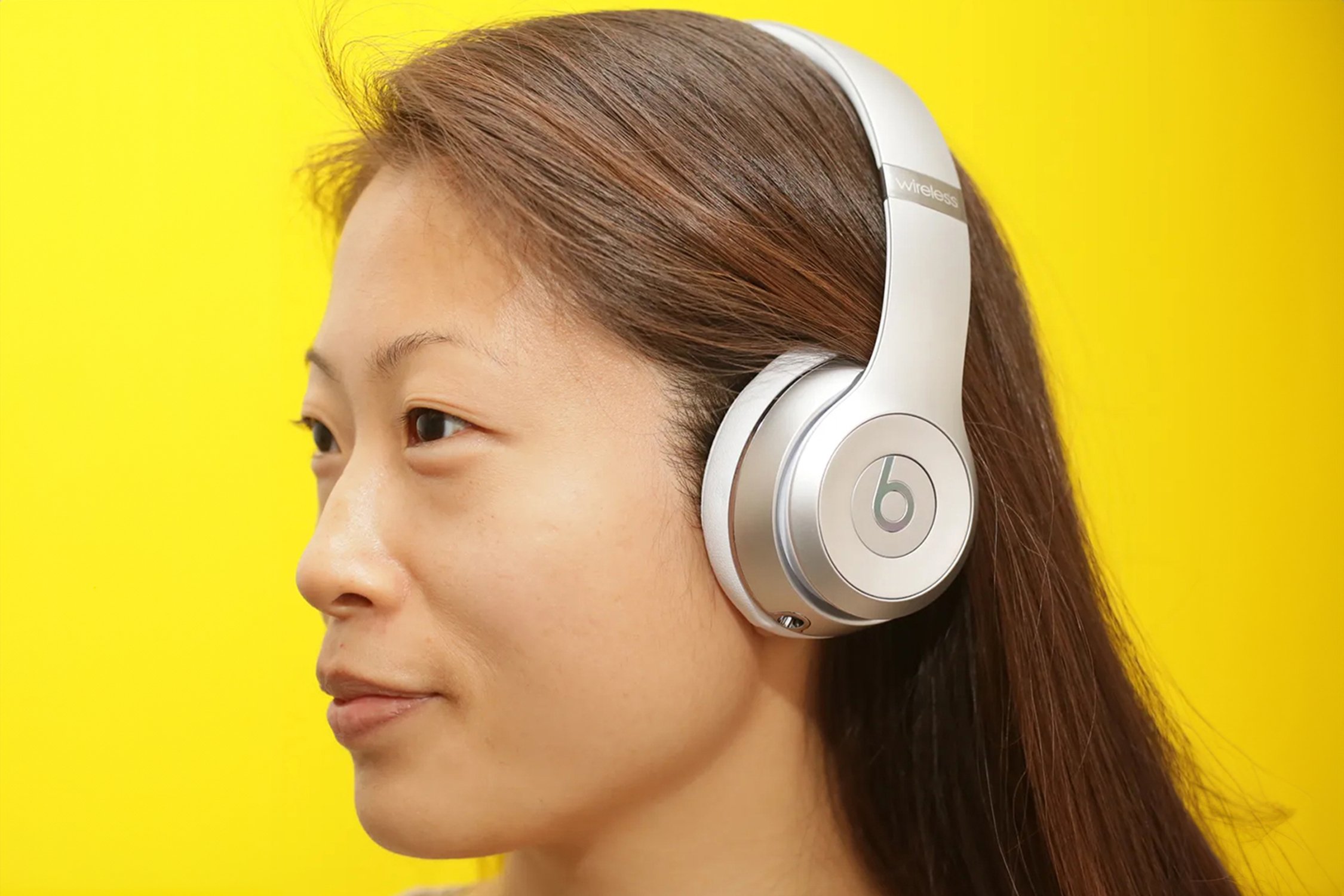 Woman wearing beats headset