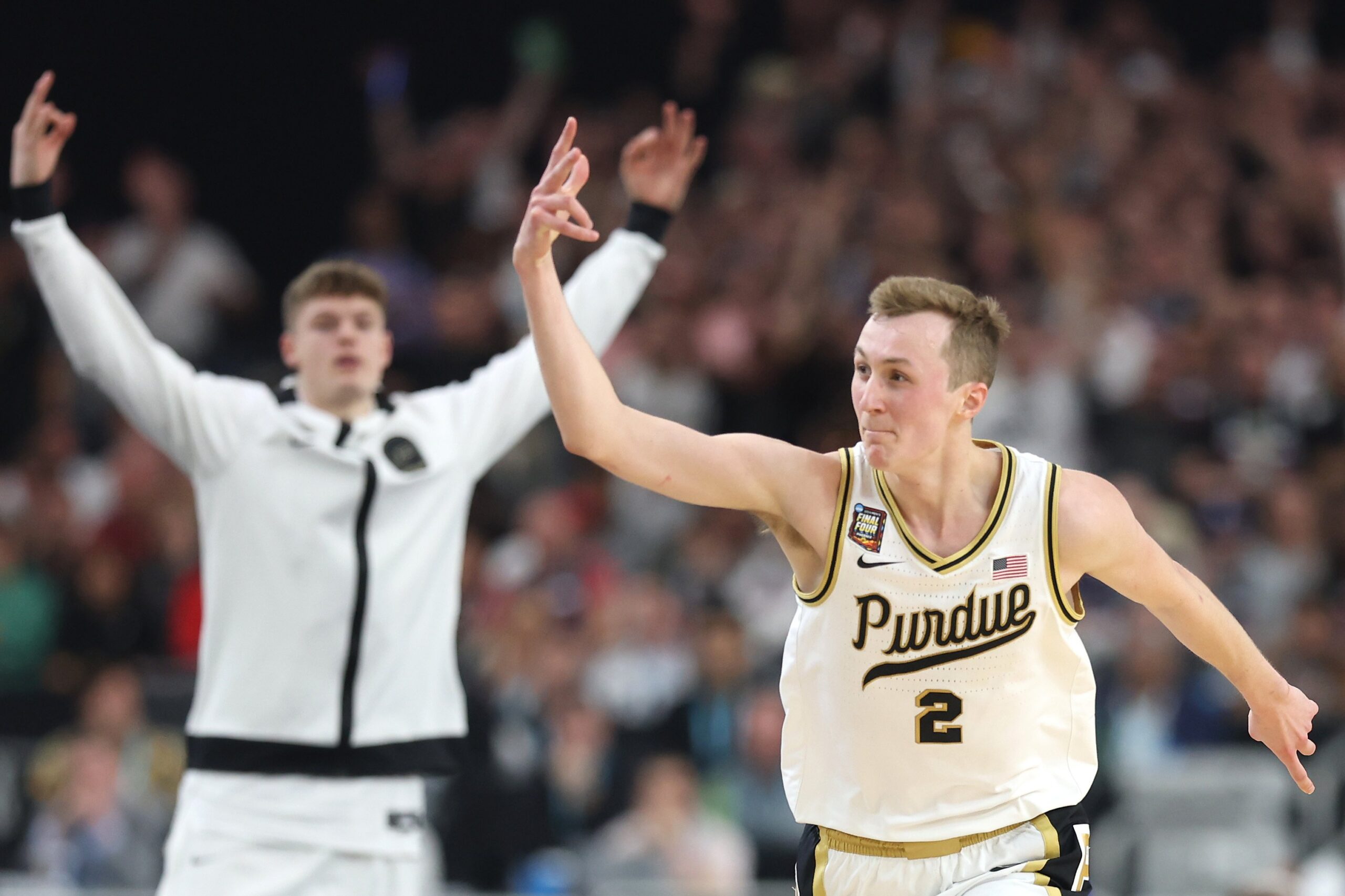 Fletcher Loyer #2 of the Purdue Boilermakers celebrates after making a shot in the second half against the North Carolina State Wolfpack in the NCAA Men's Basketball Tournament Final Four semifinal game at State Farm Stadium on April 6, 2024, in Glendale, Arizona.