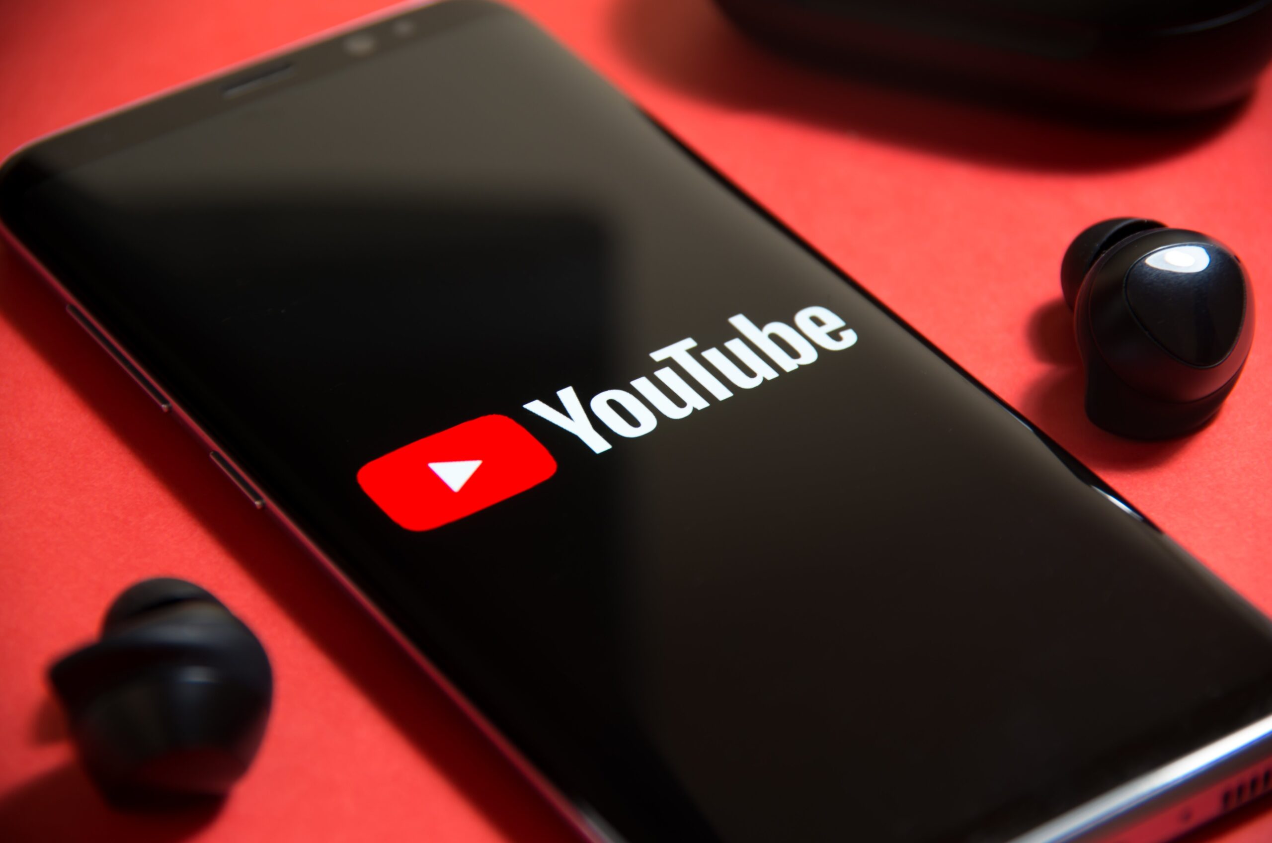 YouTube logo on a smartphone