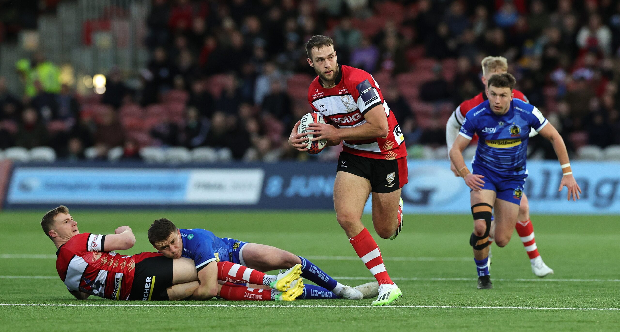 Max Llewellyn of Gloucester breaks with the ball