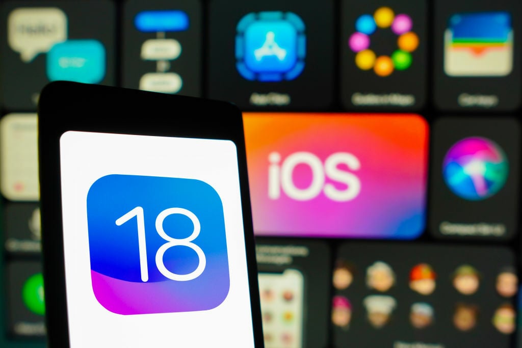 iOS 18 logo on phone screen