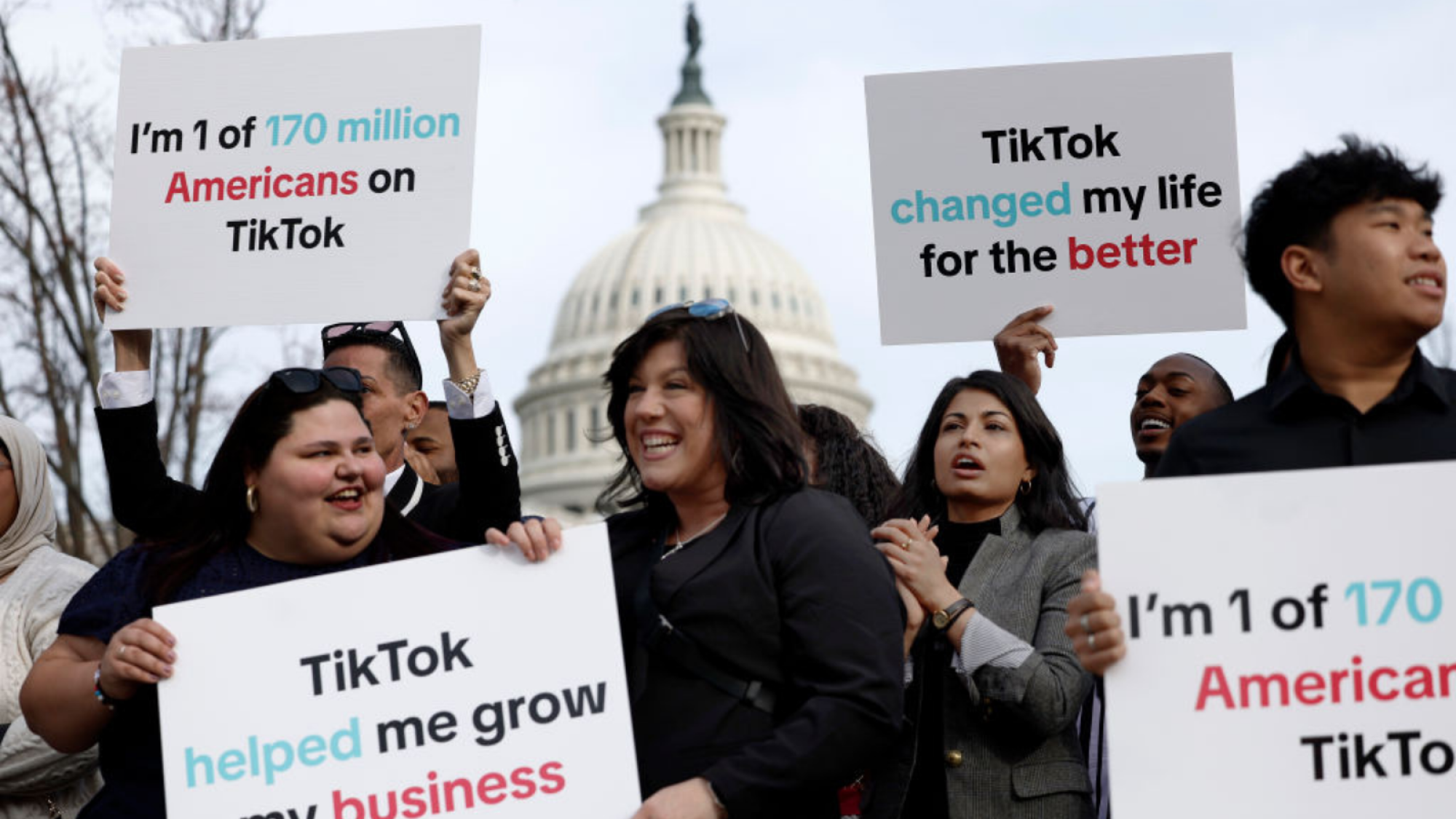 Protestors hold signs in support of TikTok outside the U.S. Capitol Building on March 13, 2024 in Washington, DC.