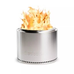 the solo stove bonfire 2.0 with flame on a white background