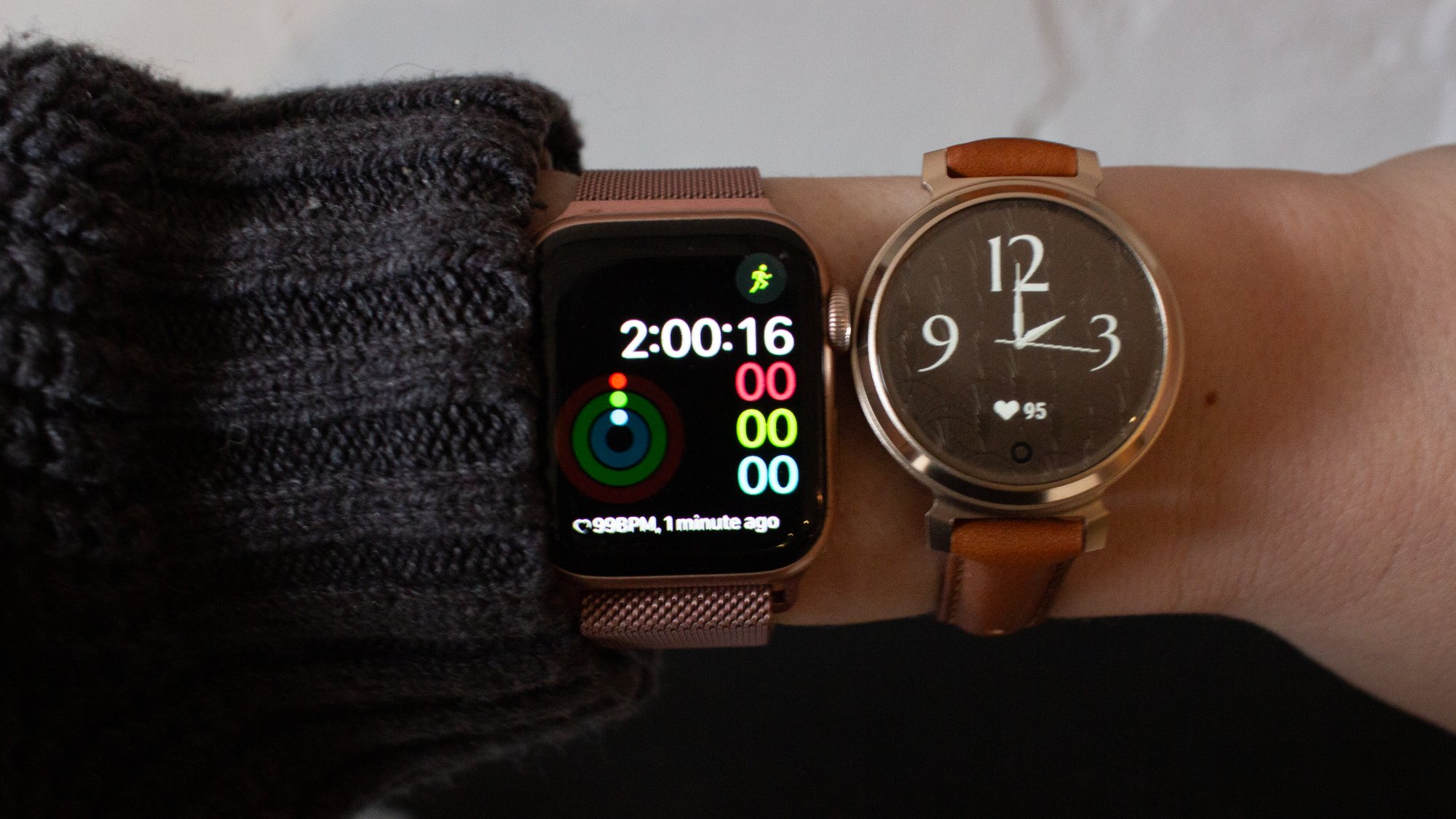 Garmin Lily 2 Watcha and Apple Watch on wrist side by side