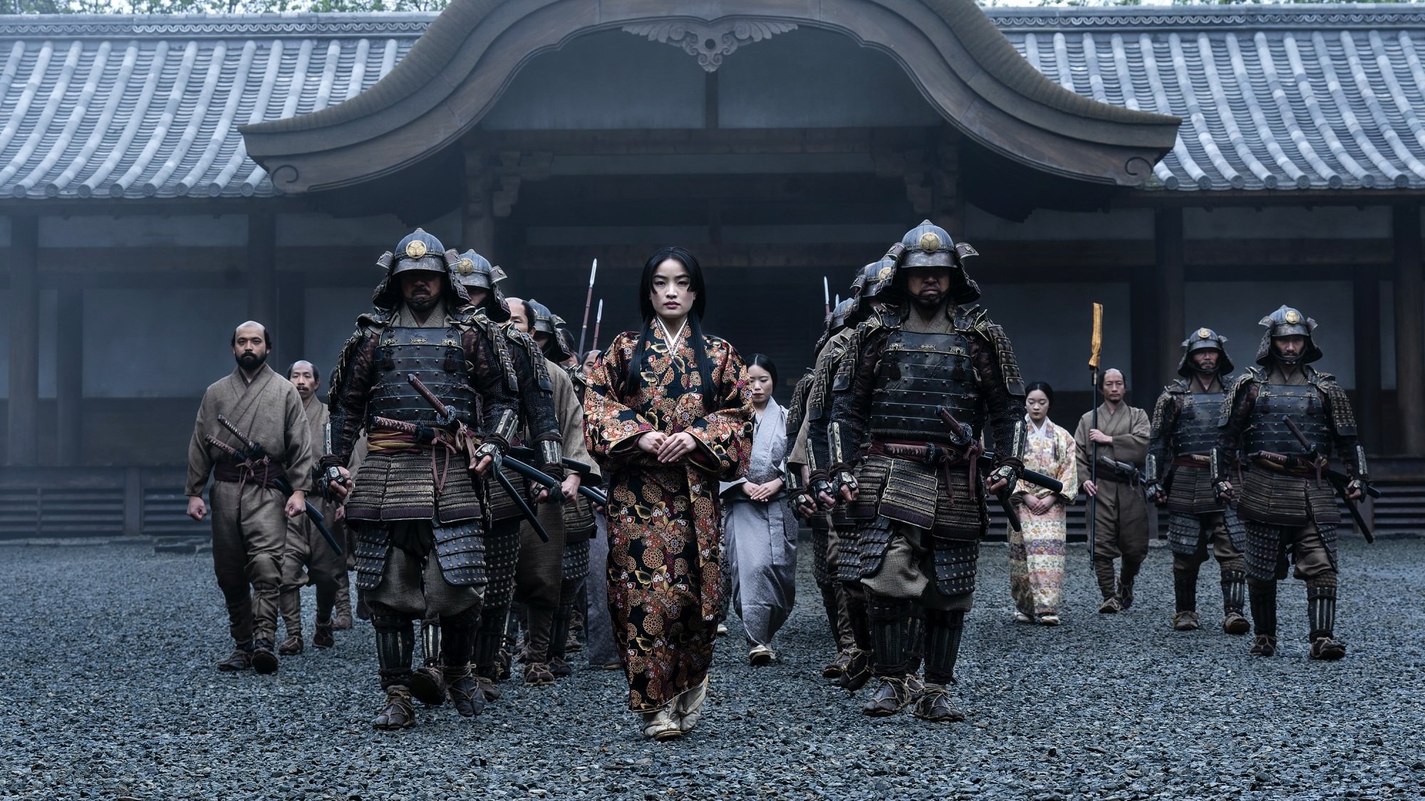 Mariko from "Shōgun" walking with her retinue of soldiers.