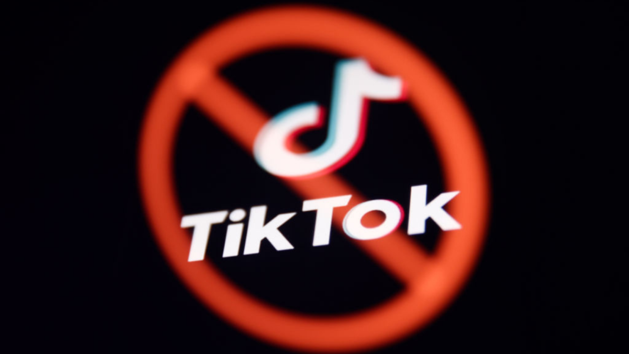 The TikTok logo with a cancellation symbol over it.