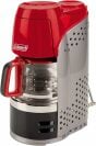 a red coleman coffee maker on a white background