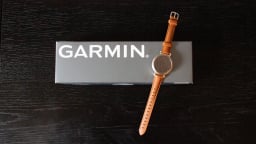 Garmin Lily 2 watch on top of its box