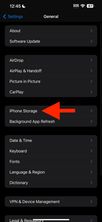 Arrow pointing to 'iPhone Storage' in iOS