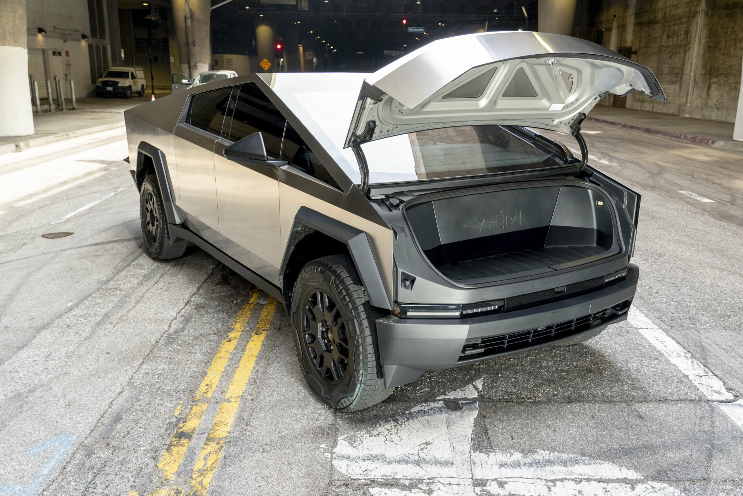 a Tesla Cybertruck with its frunk trunk or 