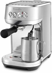 a silver Breville Bambino Plus espresso machine on a white background