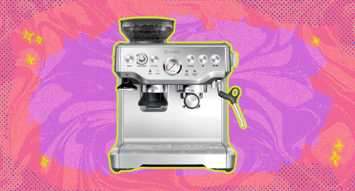 The Breville barista express against a pink background.