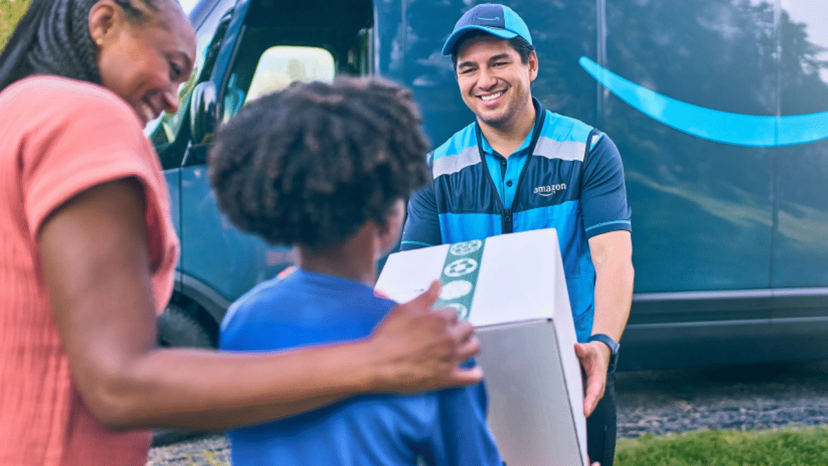 Amazon driver greeting customers by delivery vehicle
