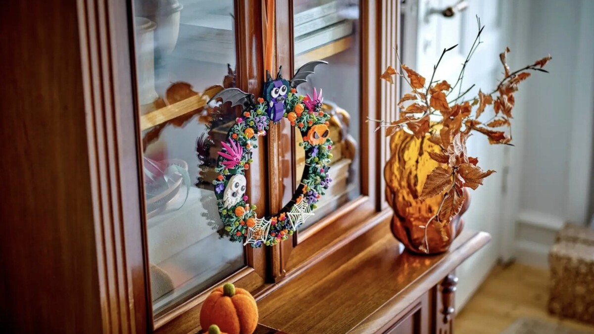 halloween wreath hanging indoors on hutch