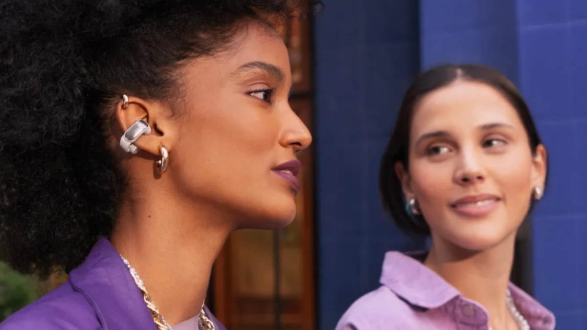 woman wearing Bose Ultra Open earbuds