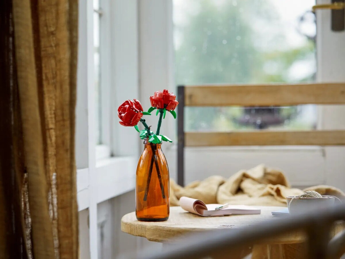 lego roses in a vase on a table