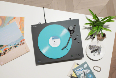 Sony PS-LX3BT wireless turntable spinning turquoise record on tabletop