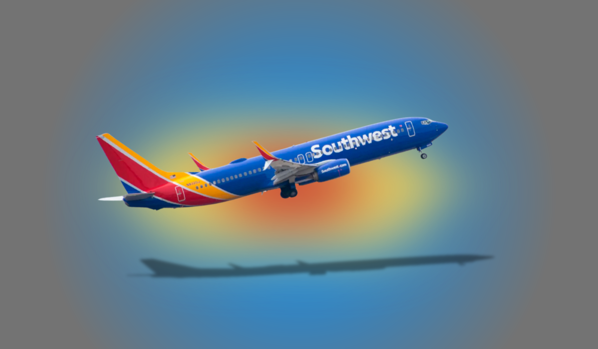 Southwest airplane arranged on yellow, orange, blue, and gray graphic