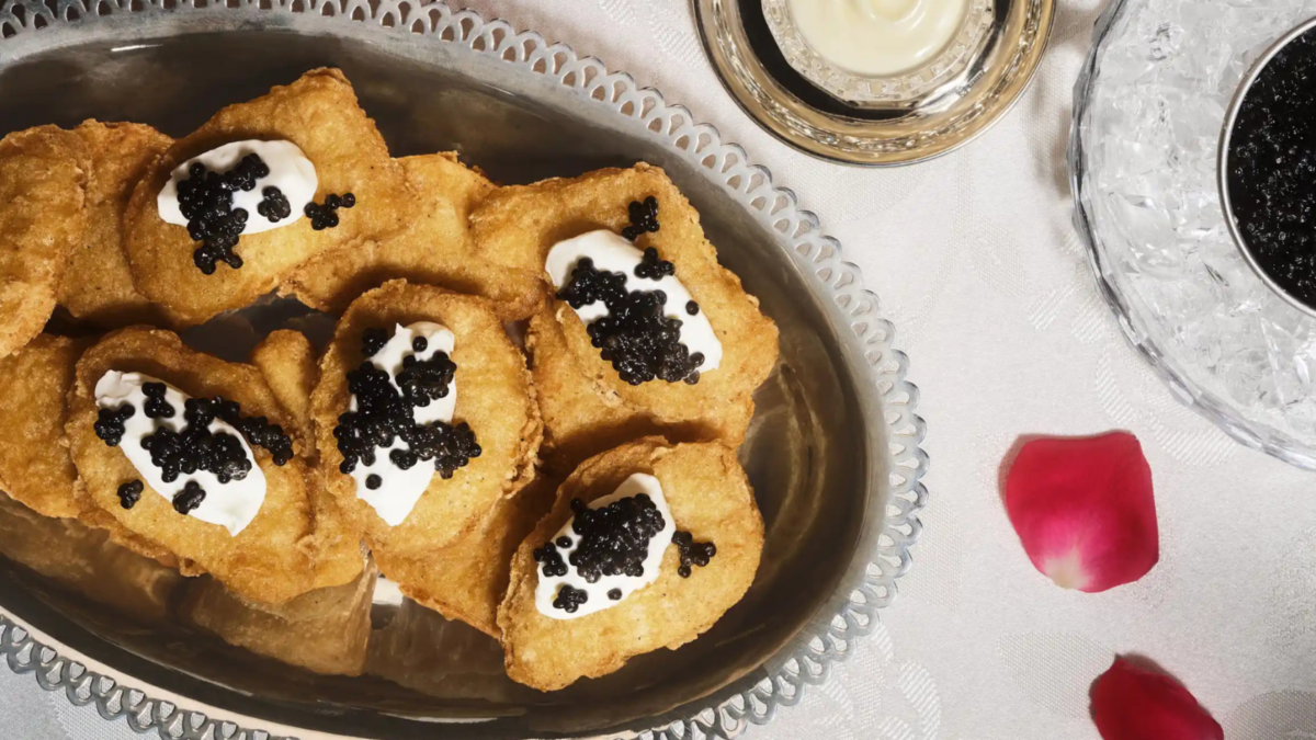 a plate of McNuggets topped with creme fraiche and caviar