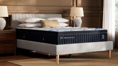 the dreamcloud premier hybrid mattress in a bedroom