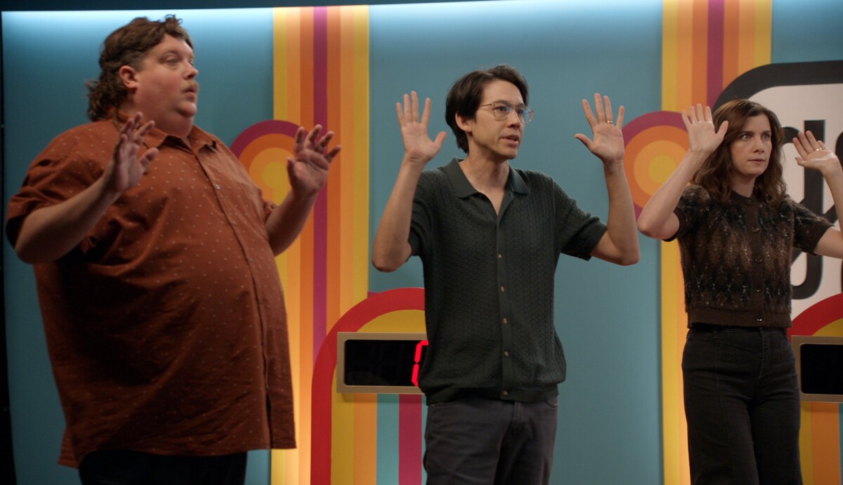 Jacob Wysocki, Zac Oyama, and Vic Michaelis on the "Game Changer" set on "The Rookie."